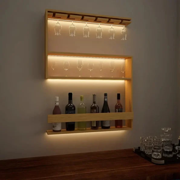 Modern Design Backlit MDF Bar Wall Shelf in Light Oak Finish, Elegant Wood Wall Shelf with Termite Proof, Water Resistant, and Weather Proof Features. Ideal for Displaying Wine Bottles and Glasses, Creating a Special Ambience. Easy to Clean and Crafted by Local Artisans of India, Perfect for Home Decor and Mini Bar Setup.